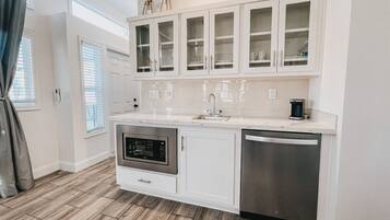 Mini-fridge, microwave, cookware/dishes/utensils