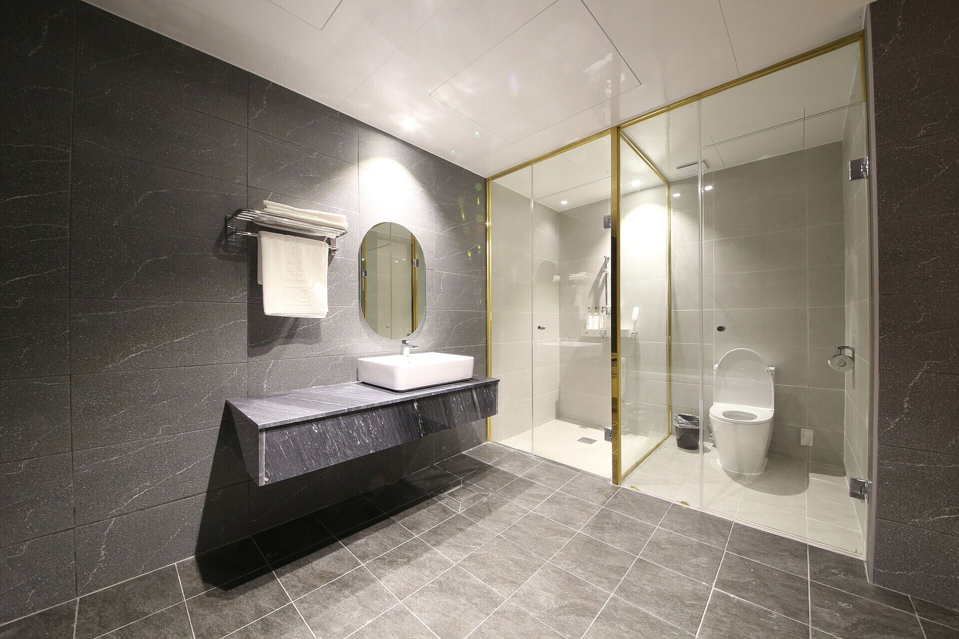 premier family twin room (only family can share rooms of more than two) | bathroom | free toiletries, hair dryer, bathrobes, slippers