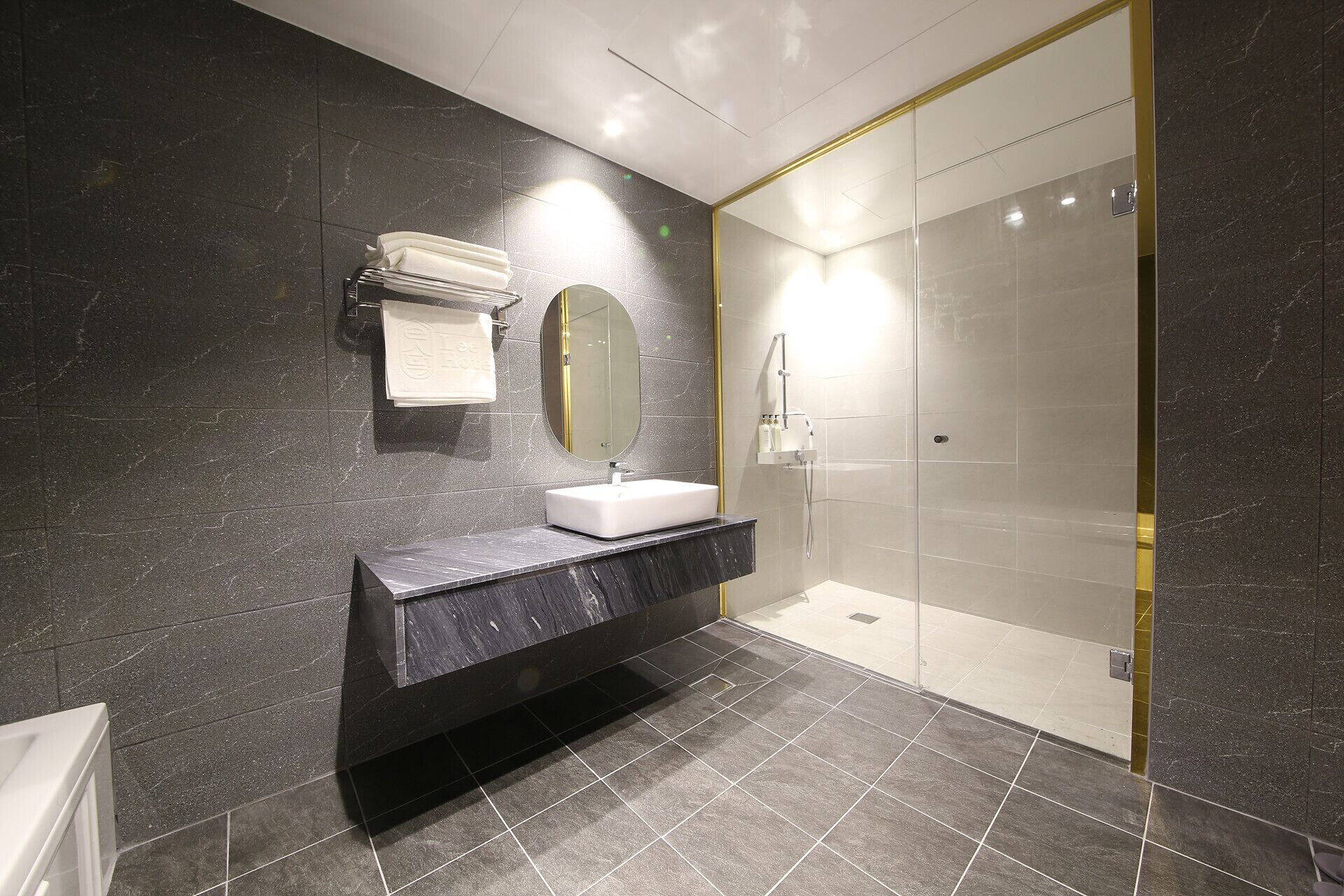 premier triple room (only family can share rooms of more than two) | bathroom | free toiletries, hair dryer, bathrobes, slippers