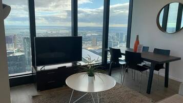 Departamento Deluxe, 2 habitaciones | Área de sala de estar
