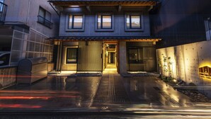 A modern two-story building with a flat roof, large windows, and a covered entrance. - HALE Kyoto Tambaguchi (Kyoto)