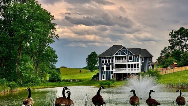 A house with a large lawn and a pond with geese. - Luxury custom home long-stay family retreat in Shepherdstown (Shepherdstown)