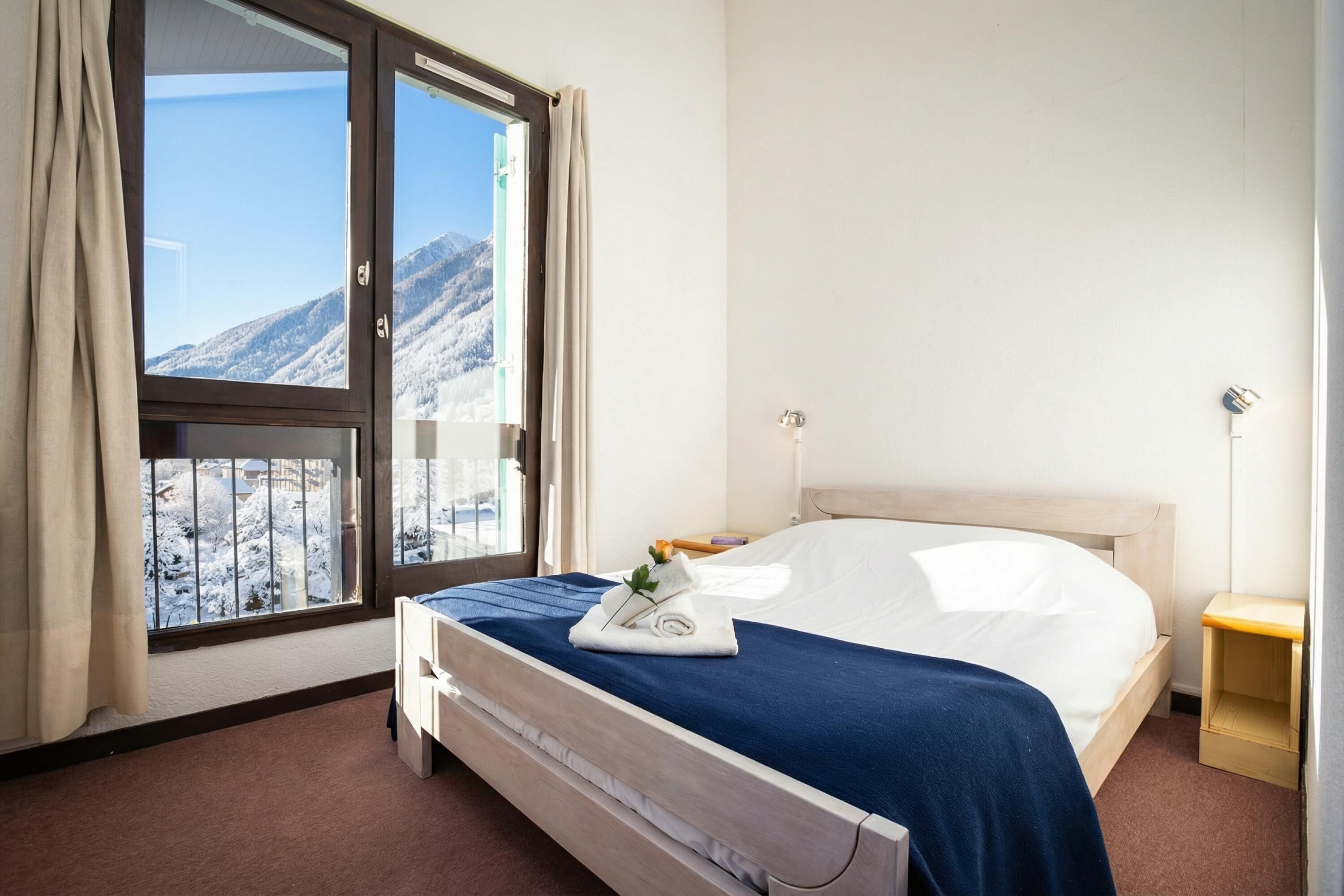 2 slaapkamers, een strijkplank/strijkijzer, beddengoed