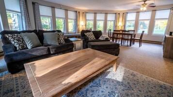 House (Just Listed! Spacious Two Bedroom Vac) | Living room | Flat-screen TV