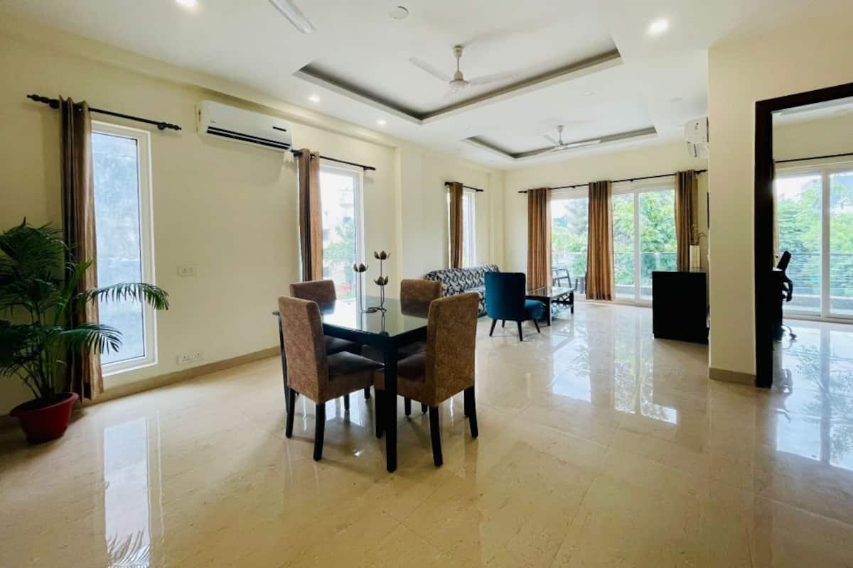 Superior Apartment, 1 Bedroom | Living area | 180-cm LED TV with satellite channels, TV, fireplace