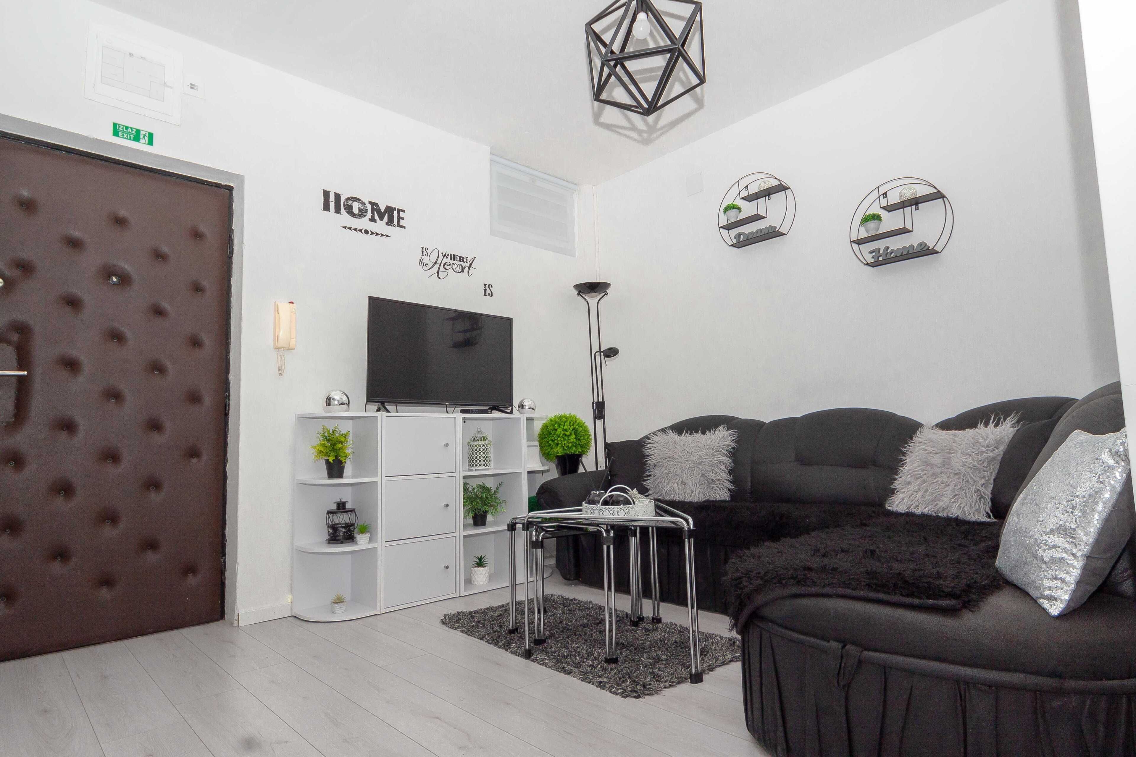 Apartment (Two Bedroom Apartment with Balcony) | Living room | Flat-screen TV