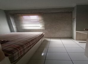 Apartamento, 2 quartos | Vista do quarto