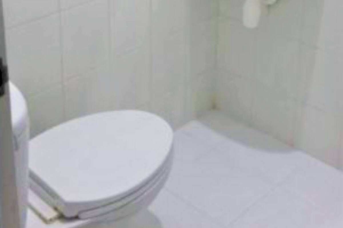 Banheiro | Chuveiro, secador de cabelo, toalhas de banho 