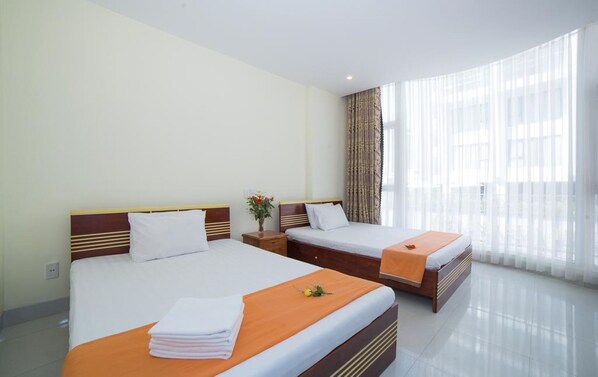 Family Room | Desk, free WiFi, bed sheets - House Land Hotel Da Nang (Da Nang)
