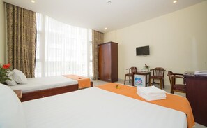 Habitación familiar | Escritorio, wifi gratis y ropa de cama 