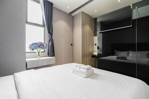 Kamar Double Standar | Wi-Fi gratis dan seprai linen