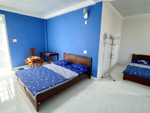Habitación familiar | Escritorio, wifi gratis, ropa de cama
