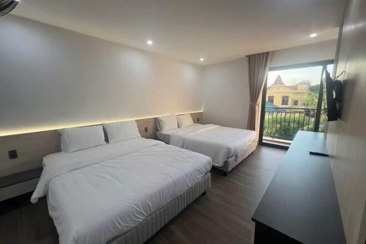 Minibar, bureau, chambres insonorisées, fer et planche à repasser