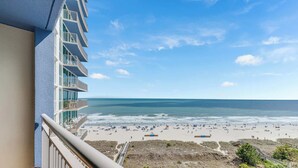 A beachfront hotel with a balcony overlooking the beach and ocean. - 8th Floor with Stunning Views Contemporary Oceanfront (North Myrtle Beach)
