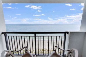 A balcony with a view of the beach and ocean. - Oceanfront,Heated Pools,Views New, Penthouse Level (Myrtle Beach)