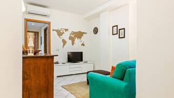 Apartment, 2 Bedrooms | Living area | Flat-screen TV