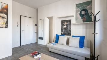 Appartement, 1 chambre | Coin séjour | Télévision à écran plat