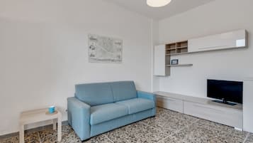 Apartment, 1 Bedroom | Living area | Flat-screen TV