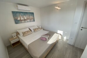 2 slaapkamers, een strijkplank/strijkijzer, wifi, beddengoed