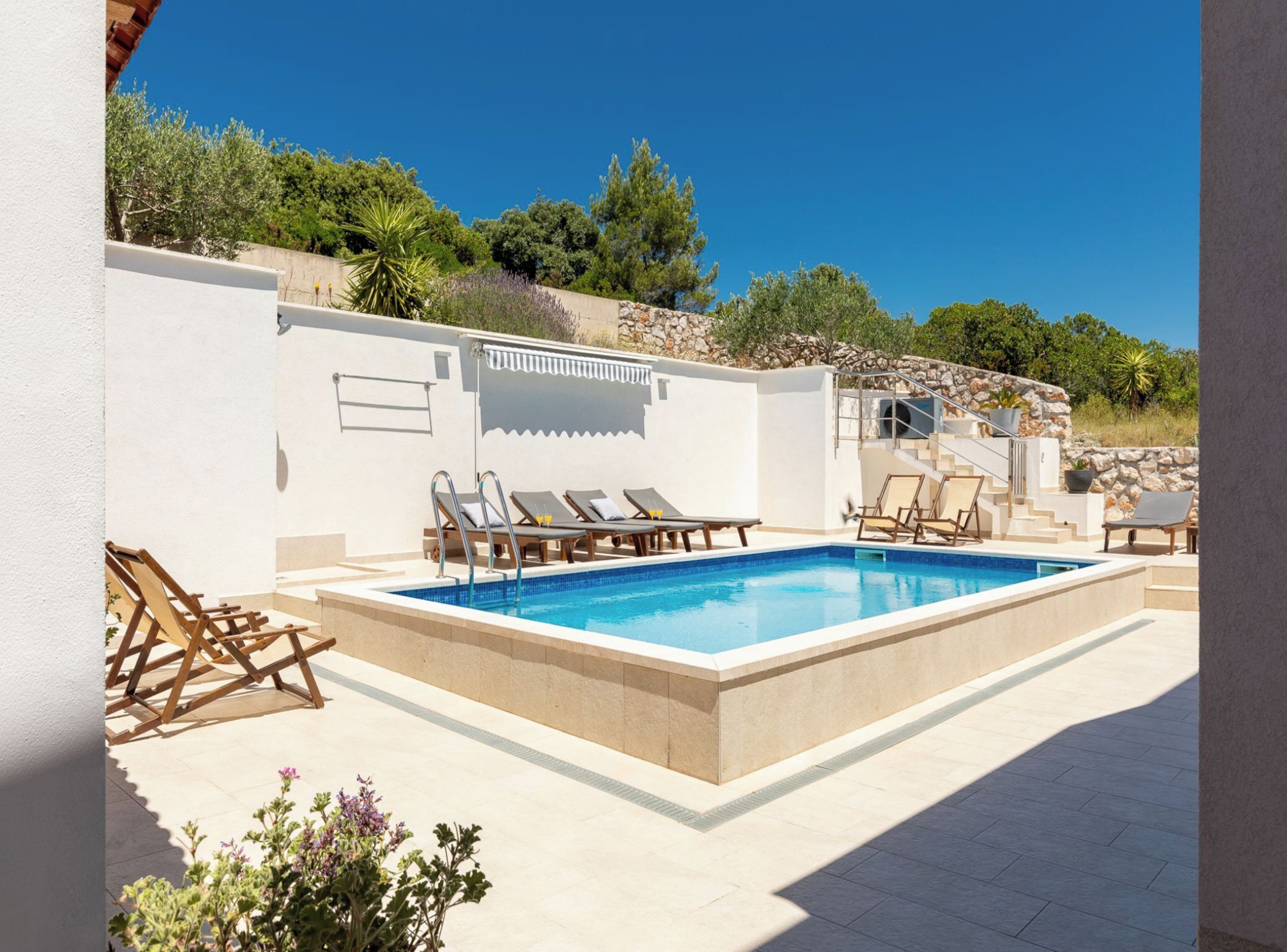 Outdoor pool, pool umbrellas, pool loungers