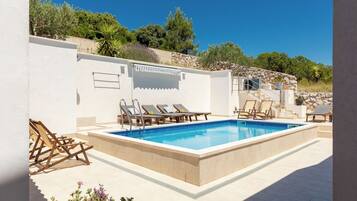Outdoor pool, pool umbrellas, pool loungers