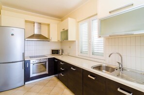 Apartment (Two Bedroom Apartment with Balcony an) | Private kitchen | Fridge