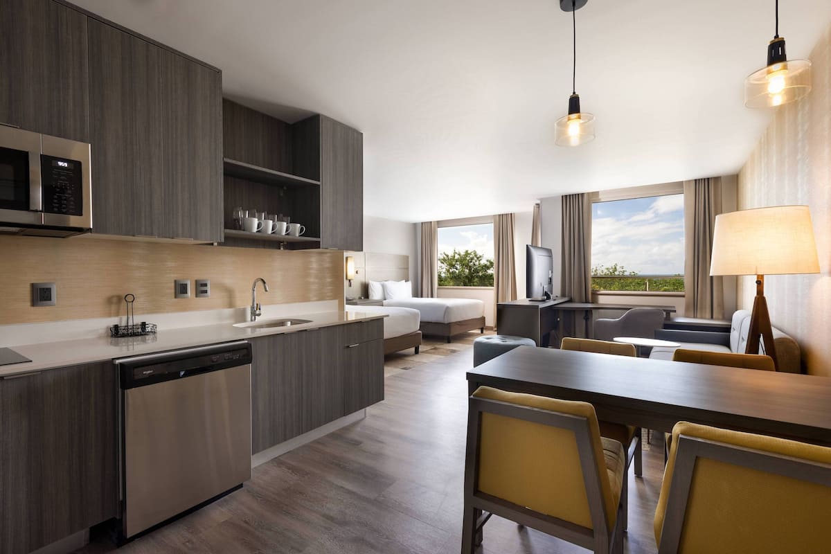 full-sized fridge, microwave, stovetop, dishwasher