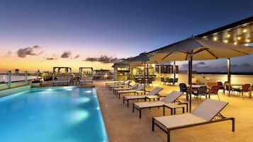 2 outdoor pools, open 8:00 AM to 8:00 PM, pool umbrellas, sun loungers