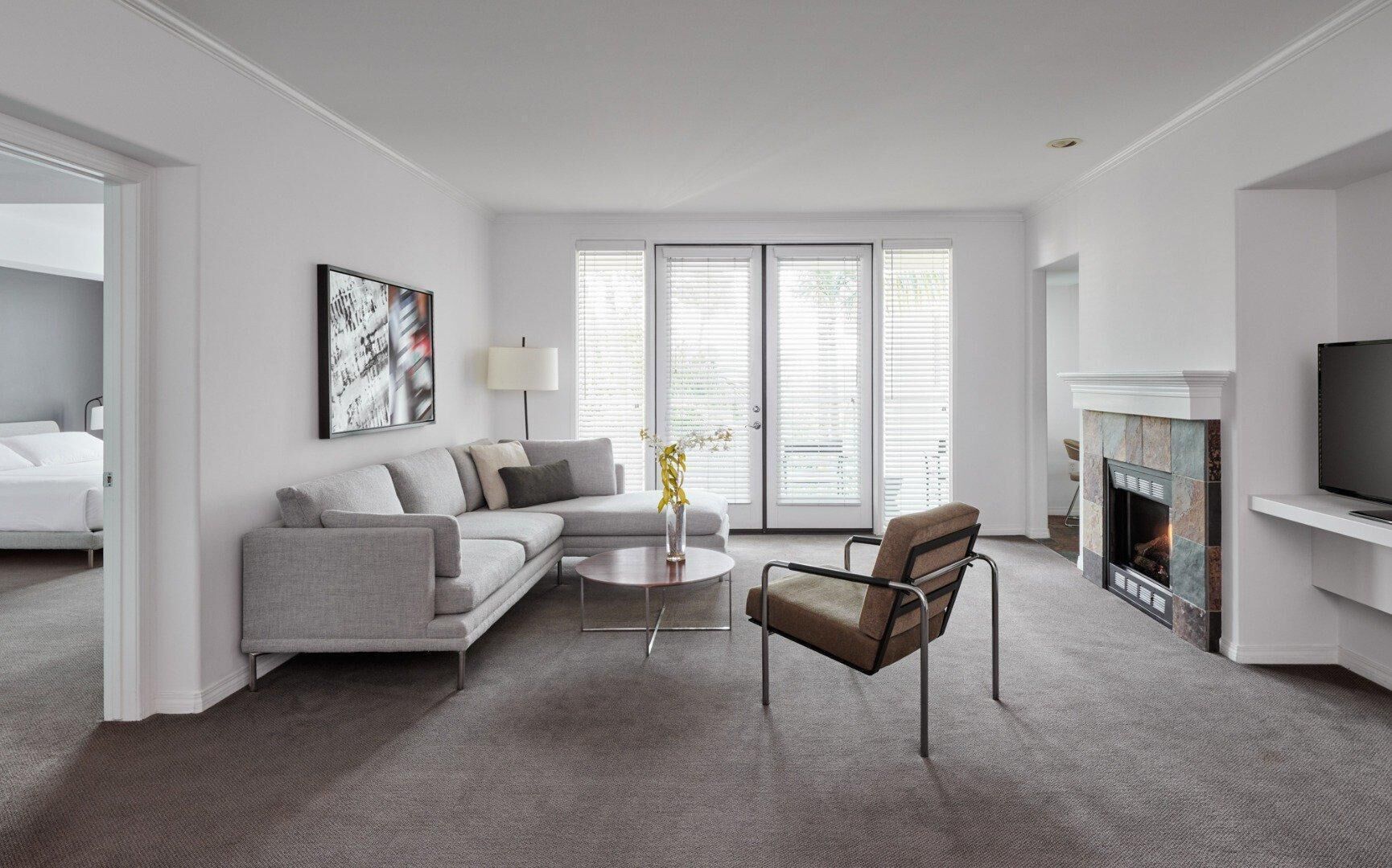 AKA Residences Sharply Appointed Suite w/ Kitchen, Den Space, Patio, & WiFi