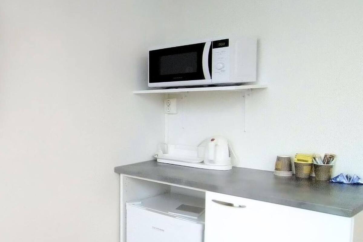 mini-fridge, microwave, electric kettle