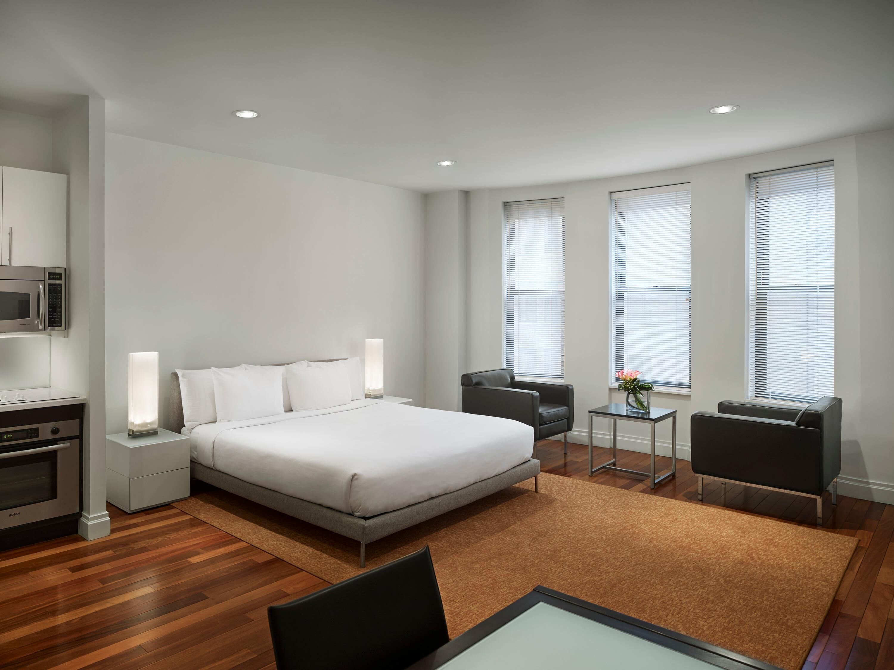 AKA Residences Elegant Studio Suite w/ Full Kitchen, Office Space, & WiFi