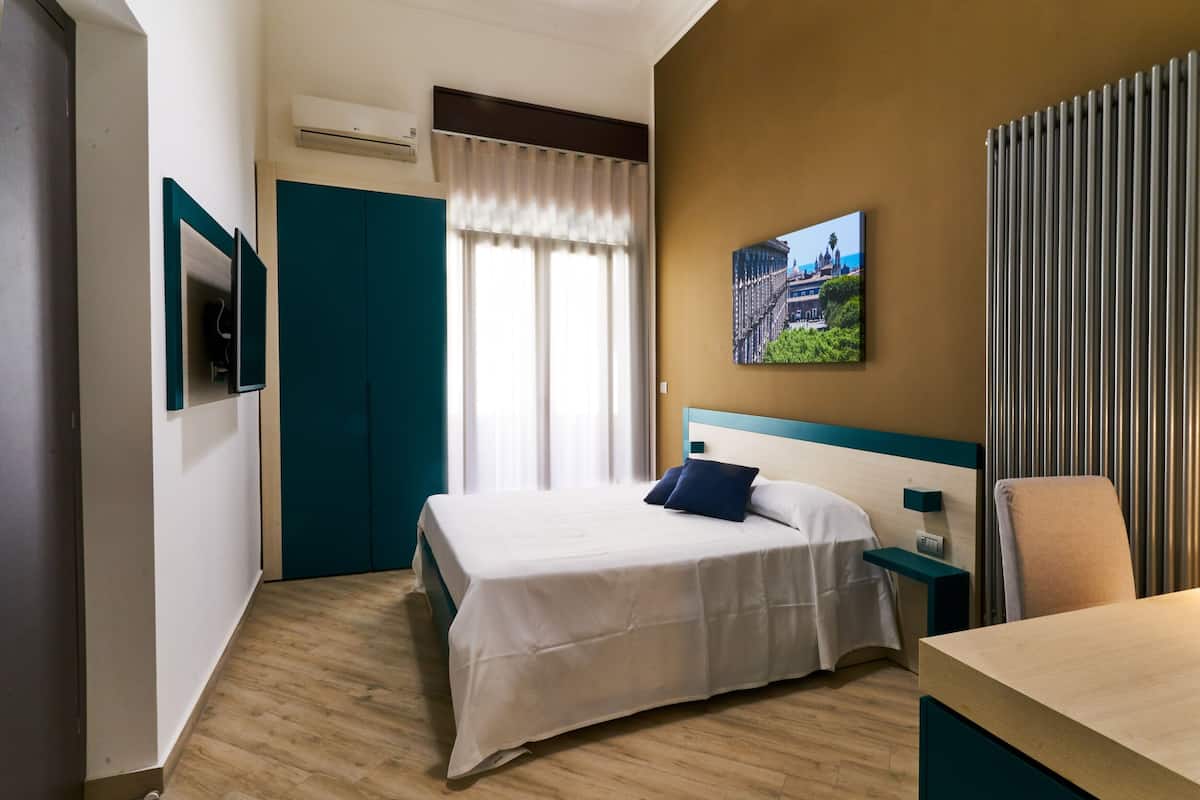 Comfort Room | Premium bedding, down comforters, memory foam beds, desk