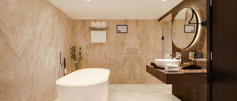 A modern bathroom with a freestanding bathtub, a vanity with a mirror, and a towel rack.