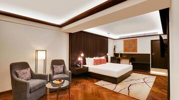 Suíte premier | Frigobar, cofres nos quartos, escrivaninha