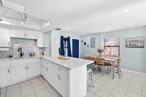 Fridge, microwave, oven, stovetop - 🐾 Pet Friendly, Heated Pool, Gorgeous Renovation, Walk to the sugar sand of FMB! (Fort Myers Beach)