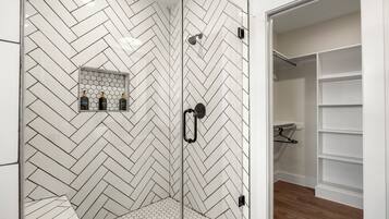 Combined shower/tub, hair dryer, towels, soap