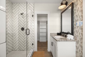 Combined shower/tub, hair dryer, towels, soap
