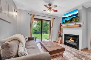 TV, fireplace - SnowPine Condo, King Bed, Patio + Fireplace (Ellicottville)