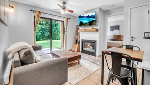 TV, fireplace - SnowPine Condo, King Bed, Patio + Fireplace (Ellicottville)