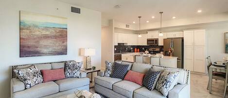 Modern Grandeur: Immerse yourself in luxury with our condo's living room – a showcase of contemporary design, top-notch amenities, and a welcoming atmosphere