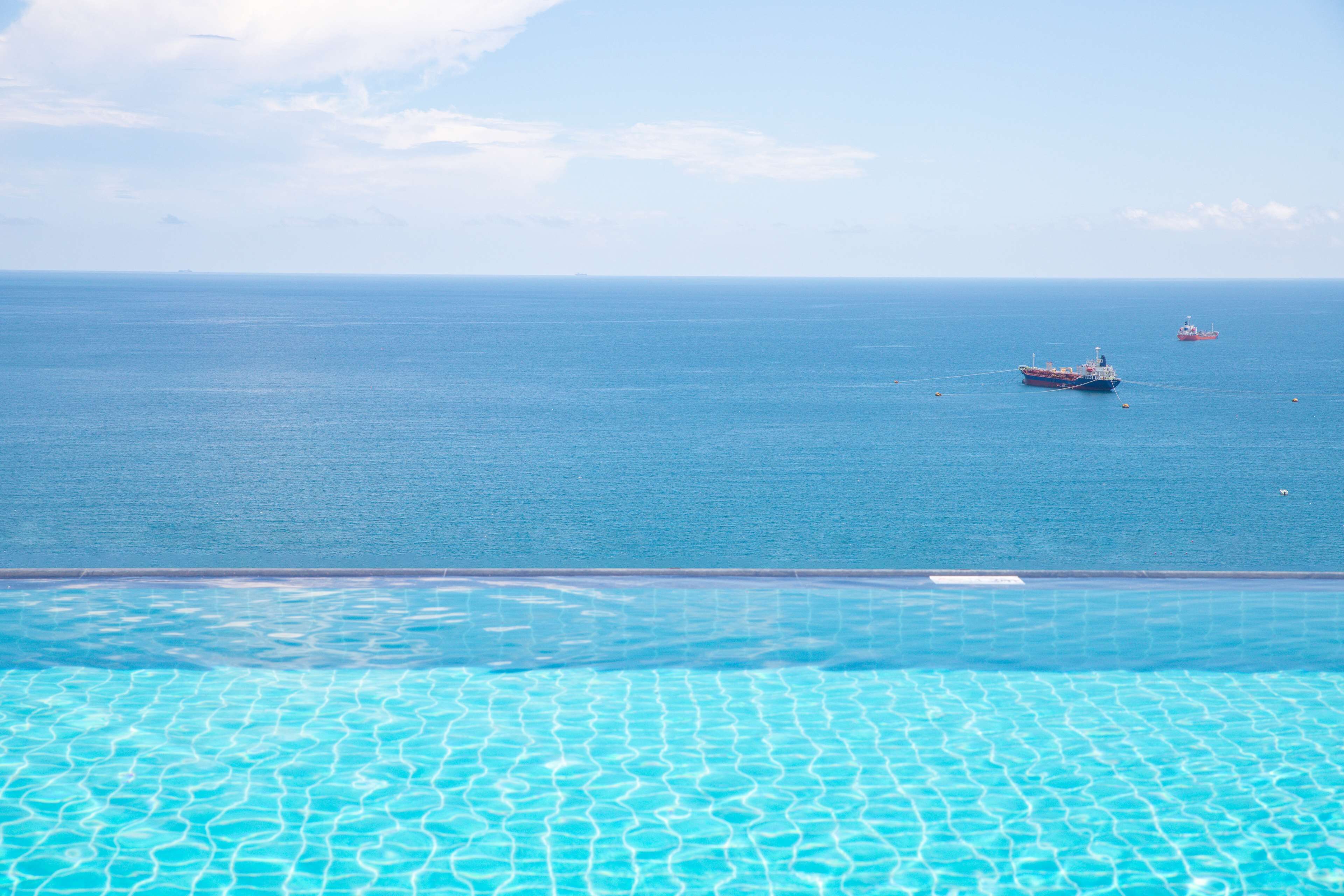 outdoor pool, open 6:00 am to 9:00 pm, pool loungers