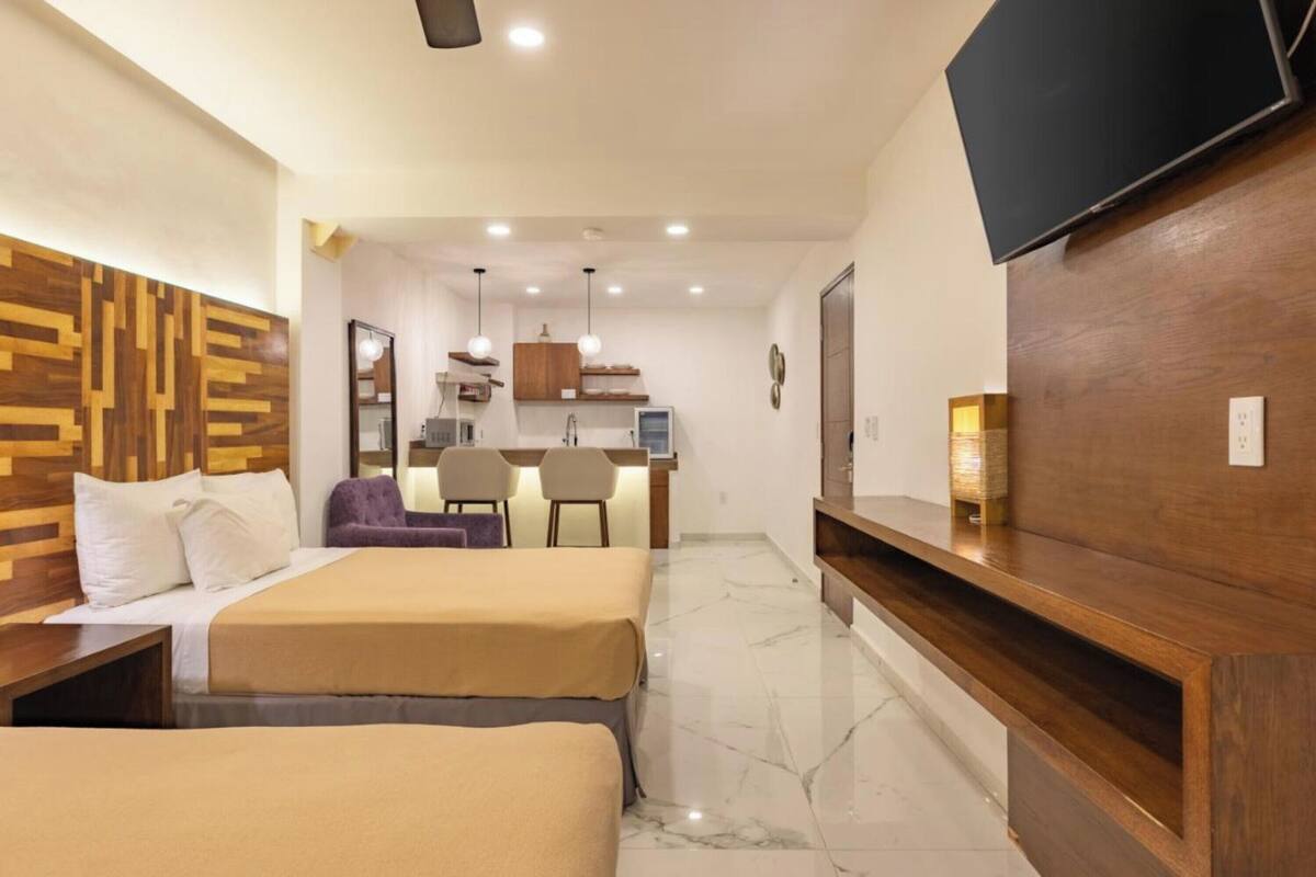 Studio Suite Deluks | Seprai premium, selimut bulu angsa, dan tempat tidur Tempur-Pendic