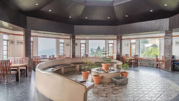 Breakfast, lunch, dinner served; Indian cuisine, garden views