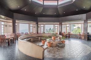 Breakfast, lunch, dinner served; Indian cuisine, garden views