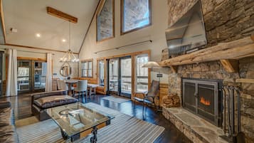 Télévision, cheminée, table de tennis de table