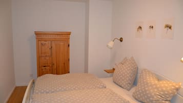 1 bedroom, desk, iron/ironing board, travel crib