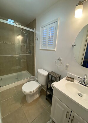 Shower, hair dryer, towels, soap