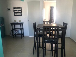 Enjoy meals in this dining area with a rectangular table and six chairs.