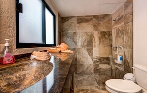 Shower, hair dryer, towels, soap