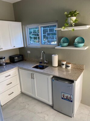 Fridge, microwave, coffee/tea maker, electric kettle